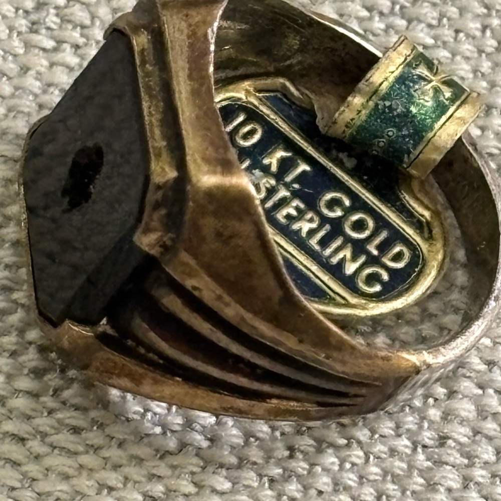 Man’s 10 KT gold on sterling ring with original tag!